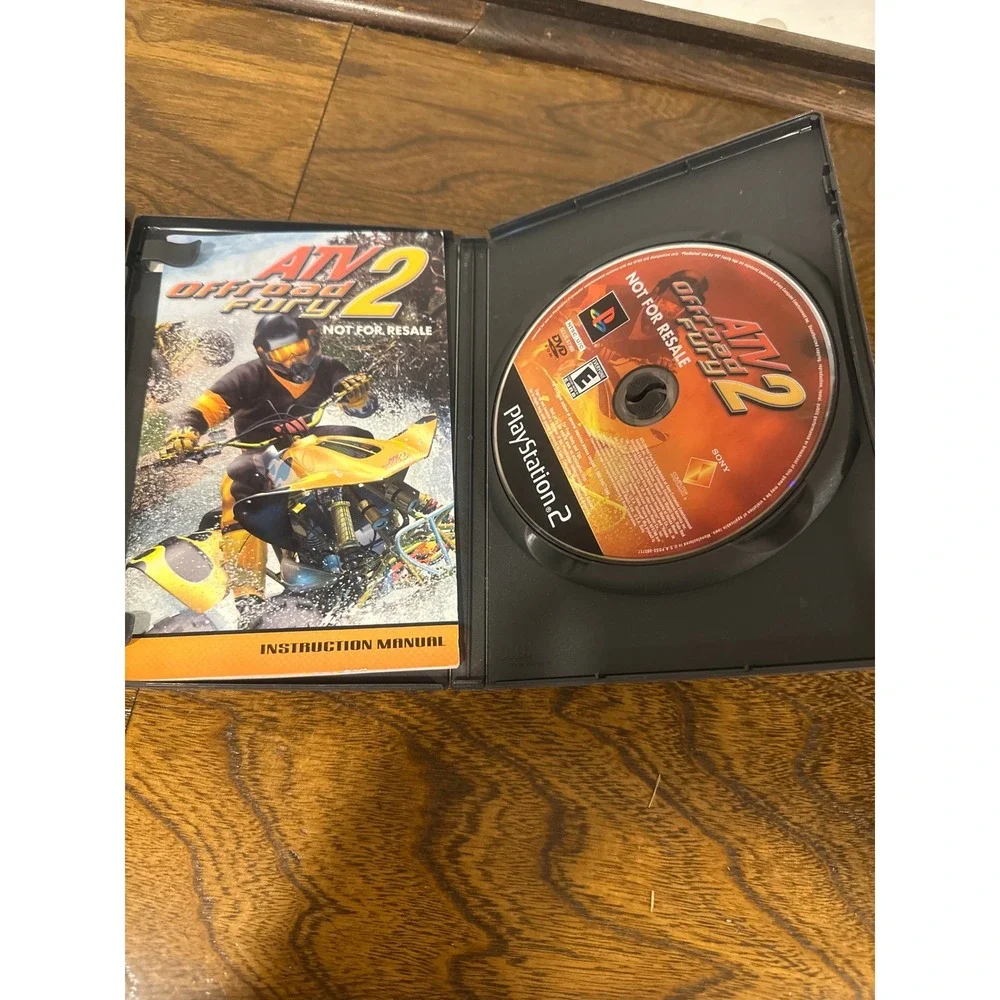 PS2 Game Lot Ultimate Board Game Collection & ATV Offroad Fury 2